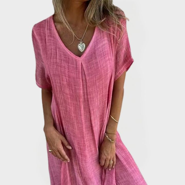 Suknelė su V formos iškirpte