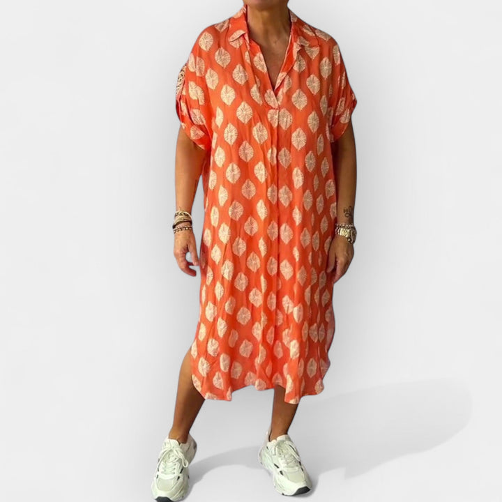 Lengva vasarinė suknelė su V formos iškirpte