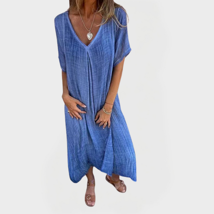 Suknelė su V formos iškirpte