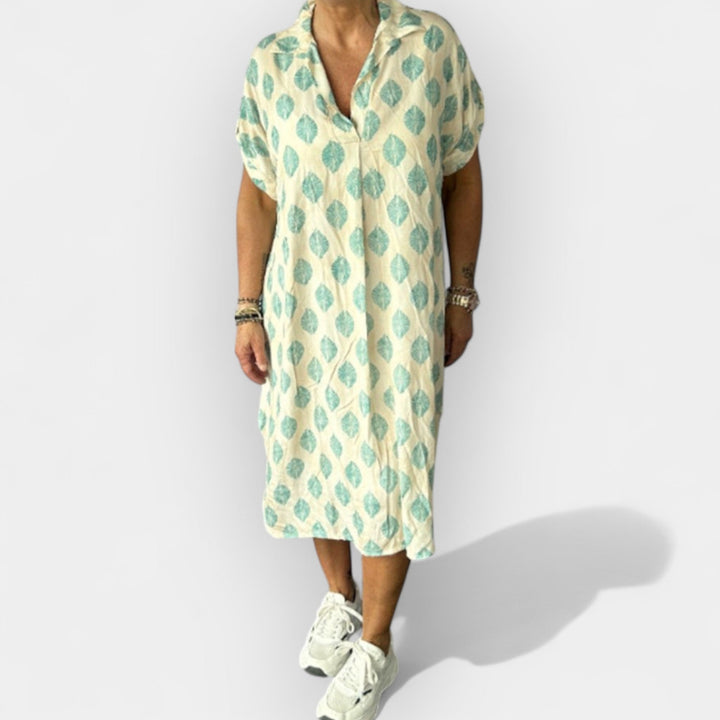 Lengva vasarinė suknelė su V formos iškirpte