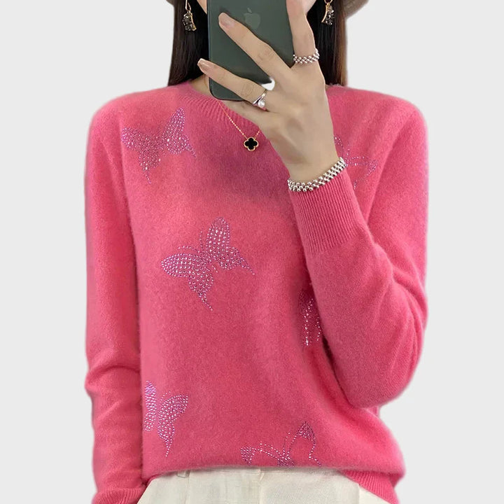 Pynėtas golfas su drugelio raštu