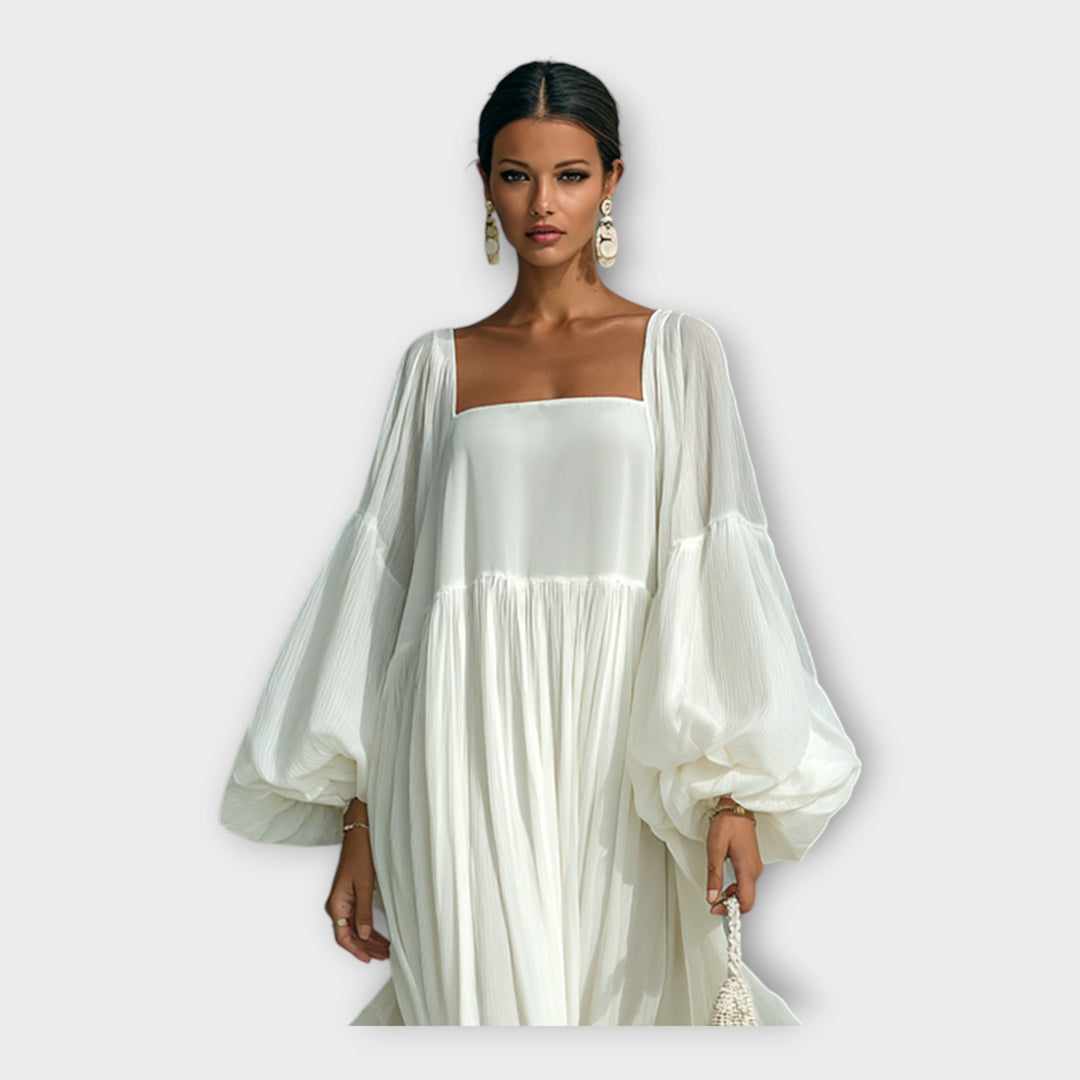 Lengva suknelė su elegantiška minimalizmo estetika